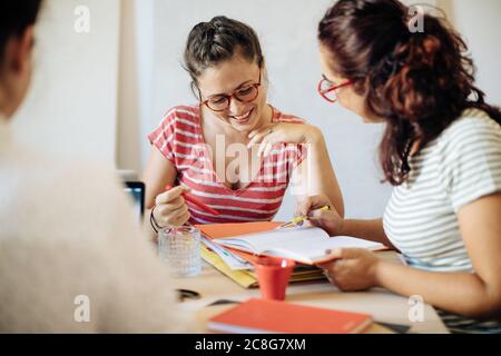 Colleagues discussing documents Stock Photo
