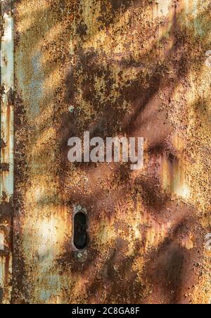 Rusting peeling paint metal wall of industrial building, Pennsylvania, USA Stock Photo