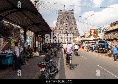 Trichy, Tamil Nadu, India - February 2020: The market street leading to the ancient tower of the  Sri Ranganathaswamy temple in Srirangam, the  larges Stock Photo