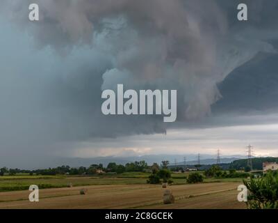 A very picturesque and dramatic sky over the Tuscan countryside during a summer storm, Bientina, Pisa, Italy Stock Photo
