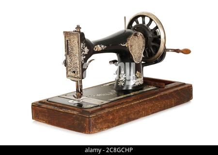 antique sewing machine isolated on white Stock Photo