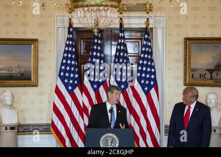 Washington, United States. 24th July, 2020. President Donald Trump presents the Presidential Medal of Freedom to Olympic track and field athlete and former member of the U.S. House of Representatives Jim Ryun in the Blue Room of the White House in Washington, DC on Friday, July 24, 2020. Pool Photo by Samuel Corum/UPI Credit: UPI/Alamy Live News Stock Photo
