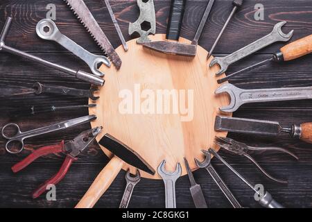 Happy Labor day concept Construction group home tools - hammer, saw, screwdriver, meter, pliers, wrench, chisel on blue wooden background Holiday card Stock Photo