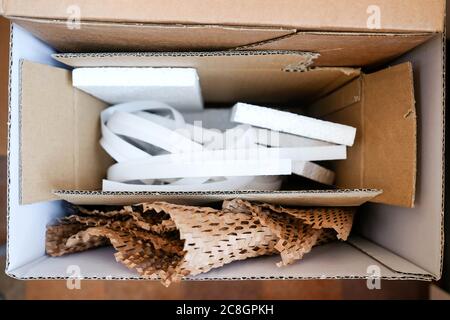 Box in a box. Storage of materials. Different packaging. Stock Photo