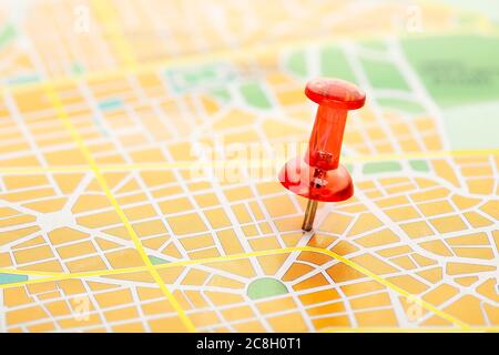 travel concept with red pushpin on map