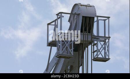 Rope suspension of a loading crane for loading and unloading of ships - upper part of the crane Stock Photo