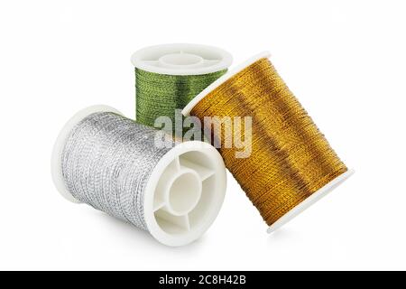 three colorful spools of thread isolated on white Stock Photo