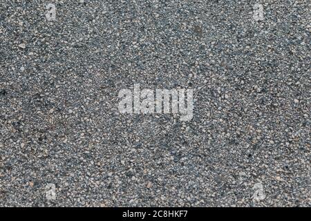 Texture gray asphalt background. Surface grunge rough asphalt. Top view of light grey asphalt. Asphalt texture pattern background. Car road, pavement, Stock Photo