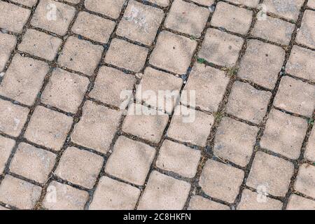 Paving slabs square with rounded edges. Abstract background. Gray paving slabs in the form of squares. Tile floor textures background. Detail of a tex Stock Photo