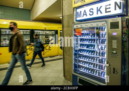 Berlin, Germany. 23rd July, 2020. A vending machine for corona protection masks is located on a platform at the subway station Turmstrasse in the Moabit district. For four weeks now, the Berlin Senate has been asking people who don't like masks to pay for them on buses and trains. (to 'BVG: 'Masked-up people in Berlin the big exception') Credit: Carsten Koall/dpa/Alamy Live News Stock Photo