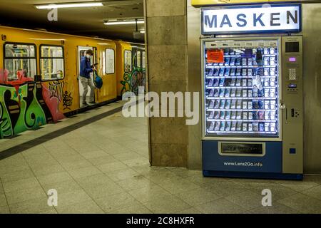 Berlin, Germany. 23rd July, 2020. A vending machine for corona protection masks is located on a platform at the subway station Turmstrasse in the Moabit district. For four weeks now, the Berlin Senate has been asking people who don't like masks to pay for them on buses and trains. (to 'BVG: 'Masked-up people in Berlin the big exception') Credit: Carsten Koall/dpa/Alamy Live News Stock Photo