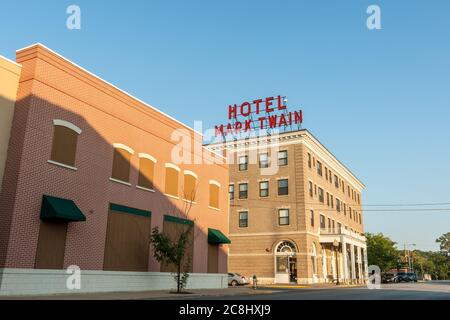 Hannibal USA - September 4 2015; Hotel Mark Twain building built in Renaissance Revival style carries large red lettering on its rooftop. Stock Photo