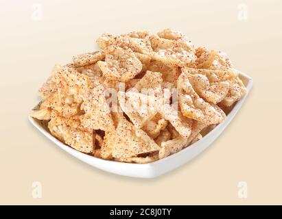 Deep fried Khichiya Papad, Traditional Indian Snacks, Indian crunchy fried snack papad or Papadam made of rice floor served in a plate. Also known as Stock Photo