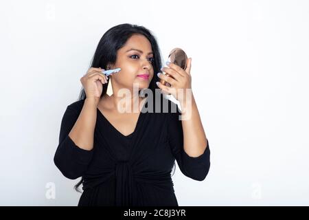 Young Asian girl is using a razor to shave armpit hair Stock Photo - Alamy