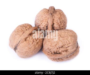 Few big walnuts isolated on white background Stock Photo