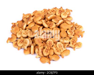 Pile of fish-shaped cookies, salt crackers isolated on white background Stock Photo
