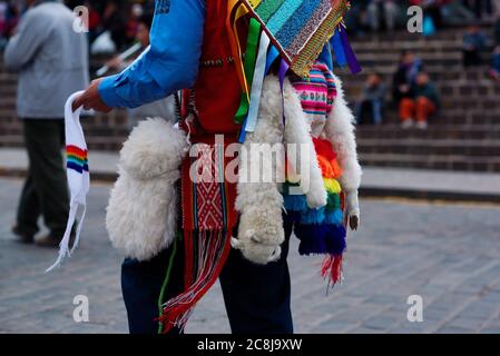 Unknown Peruvian man in traditional clothes during the Coyllority (Lord of Ice) festival, the most important indian procession in America, Plaza del A Stock Photo