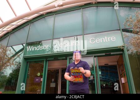 Windsor, Berkshire, UK. 25th July, 2020. Staff checking pre bookings and welcoming back members to Windsor Leisure Centre as it reopened this morning for the first time since the Coronavirus Covid-19 lockdown. Credit: Maureen McLean/Alamy Live News Stock Photo