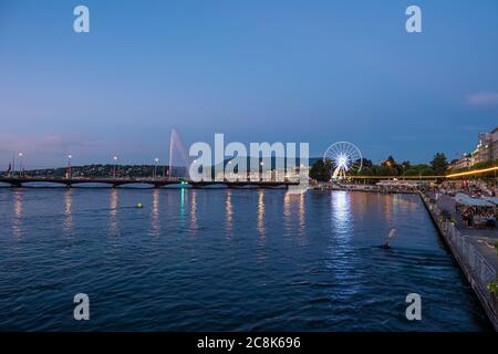 Panoramic view over Lake Geneva in the evening - GENEVA, SWITZERLAND - JULY 8, 2020 Stock Photo