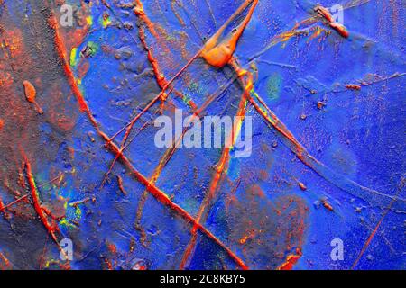 Close up detail of a acrylic painting with textures of dark blue, red and yellow Stock Photo