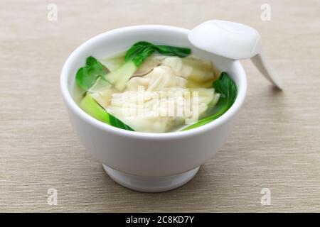 homemade wonton soup with bok choy, chinese dim sum dish Stock Photo