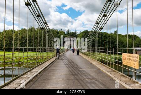 Union Suspension Bridge, 200 year old wrought iron chain bridge, English Scottish border crossing over River Tweed,, UK Stock Photo