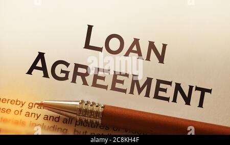 Loan Agreement word printed on page and luxury pen, business concept Stock Photo