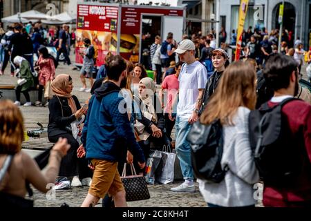 Amsterdam, Netherlands. 25th July, 2020. Crowded with tourists shopping on the streets and the Dam full of visitors with one-way traffic in the Kalverstraat, one tries to keep one and a half meters away but it is difficult amid the coronavirus threats. Credit: SOPA Images Limited/Alamy Live News Stock Photo