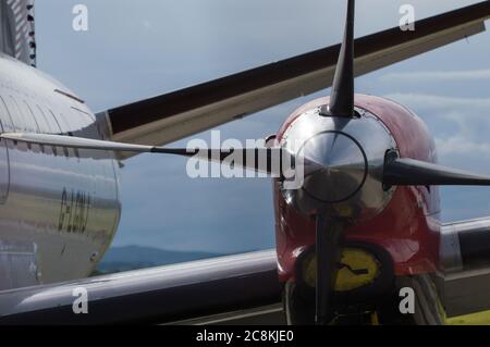 Glasgow, Scotland, UK. 21 July 2020. Pictured: Loganair Saab 340 aircraft sen on the tarmac one evening during the coronavirus (COVID19) crisis. Loganair are slowly starting back part of their flying schedule. Credit: Colin Fisher/Alamy Live News. Stock Photo