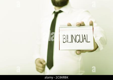 Handwriting text writing Bilingual. Conceptual photo using or able to use two languages especially with equal fluency Model displaying different empty Stock Photo