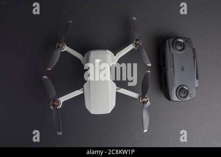 Milan, Italy - July 25, 2020: close up on a DJI Mavic Mini drone resting on a studio background, no people are visible. Stock Photo