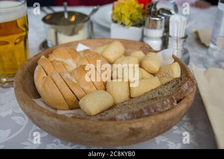 Bread basket, served on the table in a restaurant Stock Photo