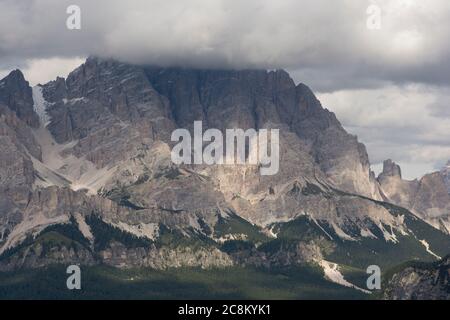 Big Mountain hiding behind a cloud, dolomite of Italy Stock Photo