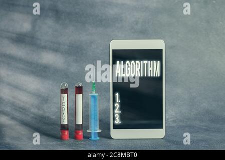 Text sign showing Algorithm. Business photo showcasing procedure for solving a problem or accomplishing tasks etc. Extracted blood sample vial with me Stock Photo