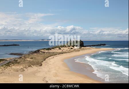 Nobby's Beach and Lighthouse - Newcastle Australia. Iconic landmark of Newcastle. Stock Photo