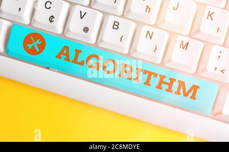 Handwriting text Algorithm. Conceptual photo procedure for solving a problem or accomplishing tasks etc. Different colored keyboard key with accessori Stock Photo