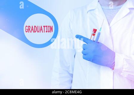 Text sign showing Graduation. Business photo showcasing the award or acceptance of an academic degree or diploma Displaying Empty Sticker Paper Access Stock Photo