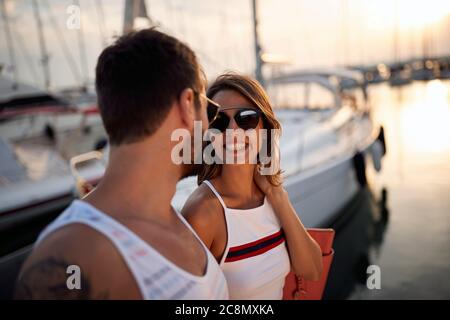 Young couple enjoys vacation and happy moments on the sea Stock Photo