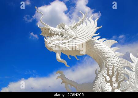 white dragon in chinese temple with beautiful sky background Stock Photo