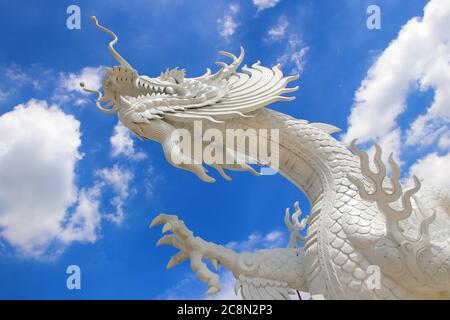 white dragon in chinese temple with beautiful sky background Stock Photo