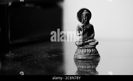 Antique Bronze Statues of Buddha.Original old and bronze-buddha-statues. Black and White Picture. Stock Photo