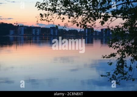 Sunset view to residential buildings at the lake Saimaa in Lappeenranta, Finland Stock Photo