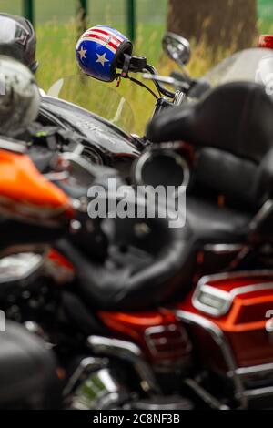 Dresden, Germany. 26th July, 2020. A helmet with the American Stars and Stripes is placed on a mirror. About 1,000 bikers on their motorcycles want to protest against the driving bans on Sundays and holidays and the tightening of operating and licensing regulations. Credit: Daniel Schäfer/dpa-Zentralbild/dpa/Alamy Live News Stock Photo