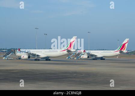 COLOMBO, SRI LANKA - FEBRUARY 24, 2020: Two Airbus A330 aircraft of the national airline of Sri Lanka - SriLankan Airlines Limited on the airfield of Stock Photo