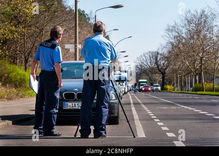 Police officers control the speed with a laser gun, speed control, two ...