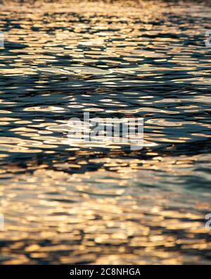 Water ripple with sunlight reflection. Summer background Stock Photo ...