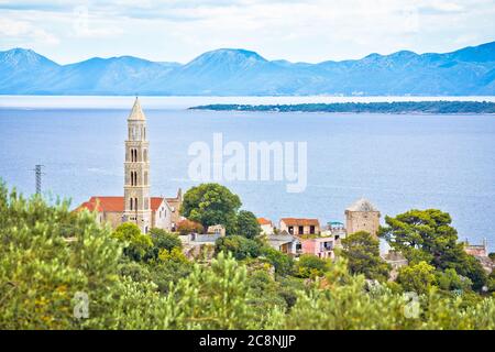 Igrane village on Makarska riviera church tower and waterfront view, Dalmatia region of Croatia Stock Photo