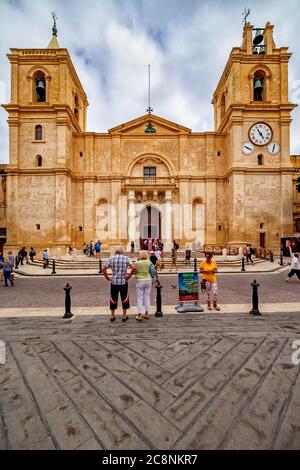 Valletta, Malta - October 10, 2019: Co-Cathedral of St. John, Cathedral Church from St. John's Square, Mannerist style city landmark. Stock Photo