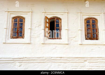 three old windows in russia Stock Photo
