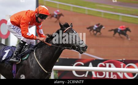 Jojo Rabbit and jockey Luke Morris coming home to win the Sky Sports Racing Sky 415 Novice Stakes at Wolverhampton Racecourse. Stock Photo